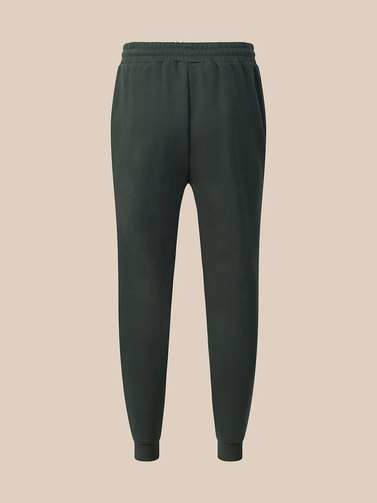 A pair of dark navy blue athletic pants with an elastic waistband, drawstring, and zippered side pockets, shown against a light gray background.