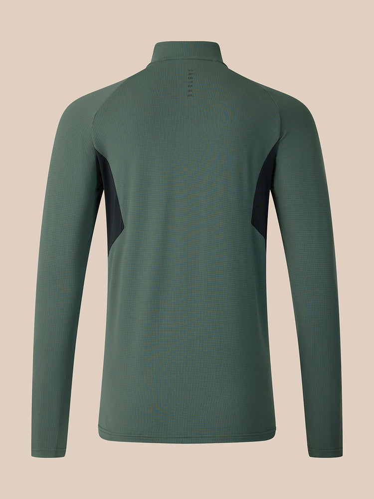 A long-sleeve athletic quarter-zip pullover shown from the back, in a muted sage green color with dark charcoal side panel accents, displayed on a neutral beige background.