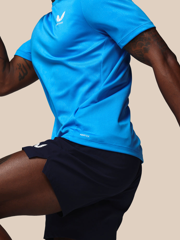 Hombre Adapt Camiseta de Manga Corta con Estampado Integral - Azul