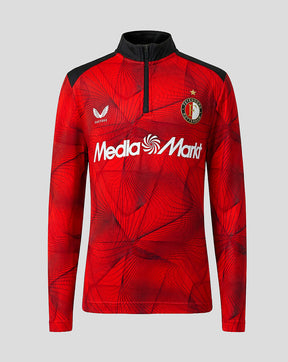 Feyenoord home matchday junior midlayer top in red with a black geometric pattern and sponsor logo.