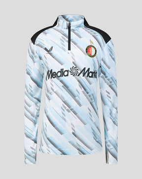 Front view of junior Feyenoord away midlayer top with pale blue abstract print and club crest.