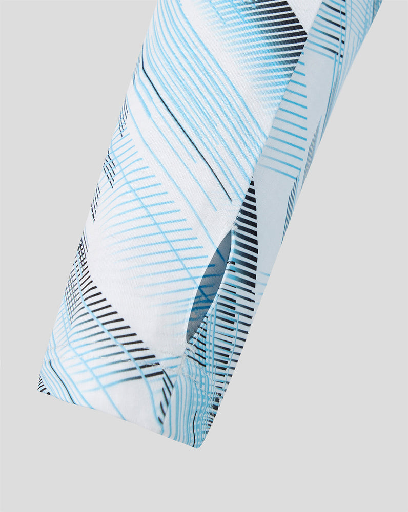 Close up of a light blue geometric pattern on the Feyenoord Uit midlayer sleeve.