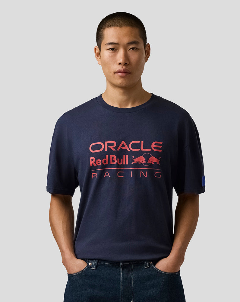 Person wearing a navy blue 'Oracle Red Bull Racing' t-shirt on a light gray background
