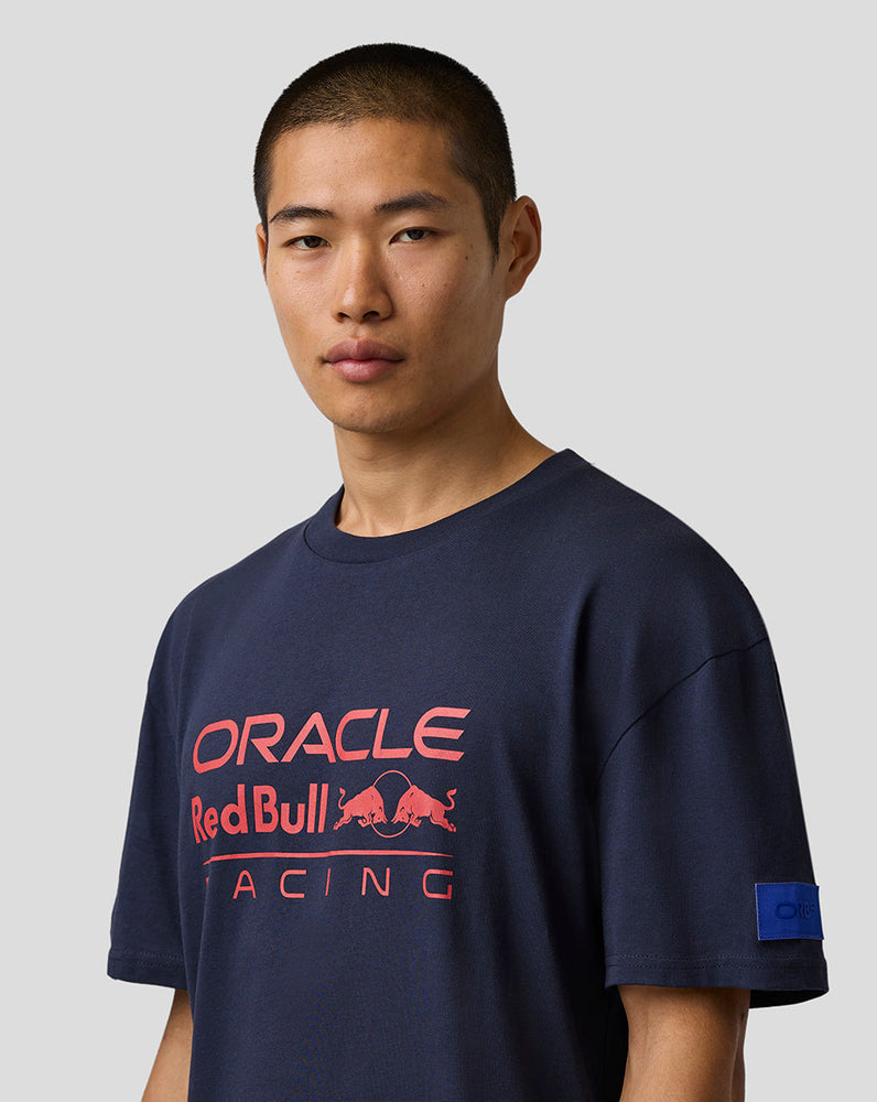Person wearing a navy blue 'Oracle Red Bull Racing' t-shirt on a light gray background